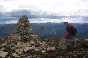 Rich, on the bench (almost) on top of the Mtn.