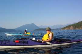 Rich and Suz, at mouth of Oakover bay, Zaphine point on right